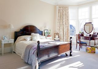 Traditional style bedroom with bay window