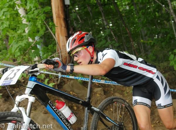 Samara Sheppard (New Zealand) pushes her bike on a section of course she finds to be unrideable