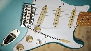 Close up of the pickups and tremolo system on a Squier Stratocaster