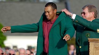 Tiger Woods receives the Green Jacket from Hootie Johnson