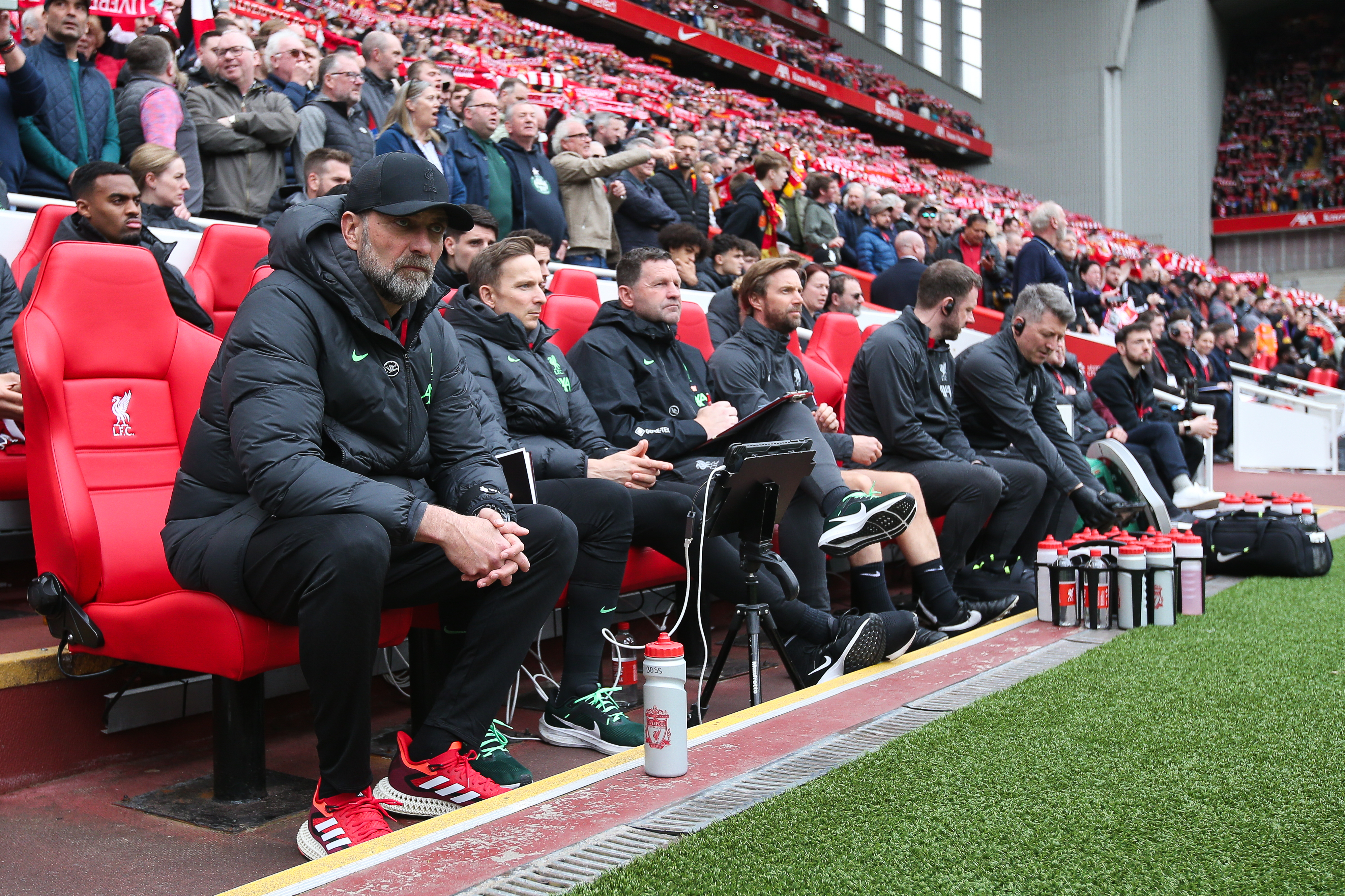 Jurgen Klopp watching Liverpool vs Crystal Palace alongside his coaching staff in April 2024.