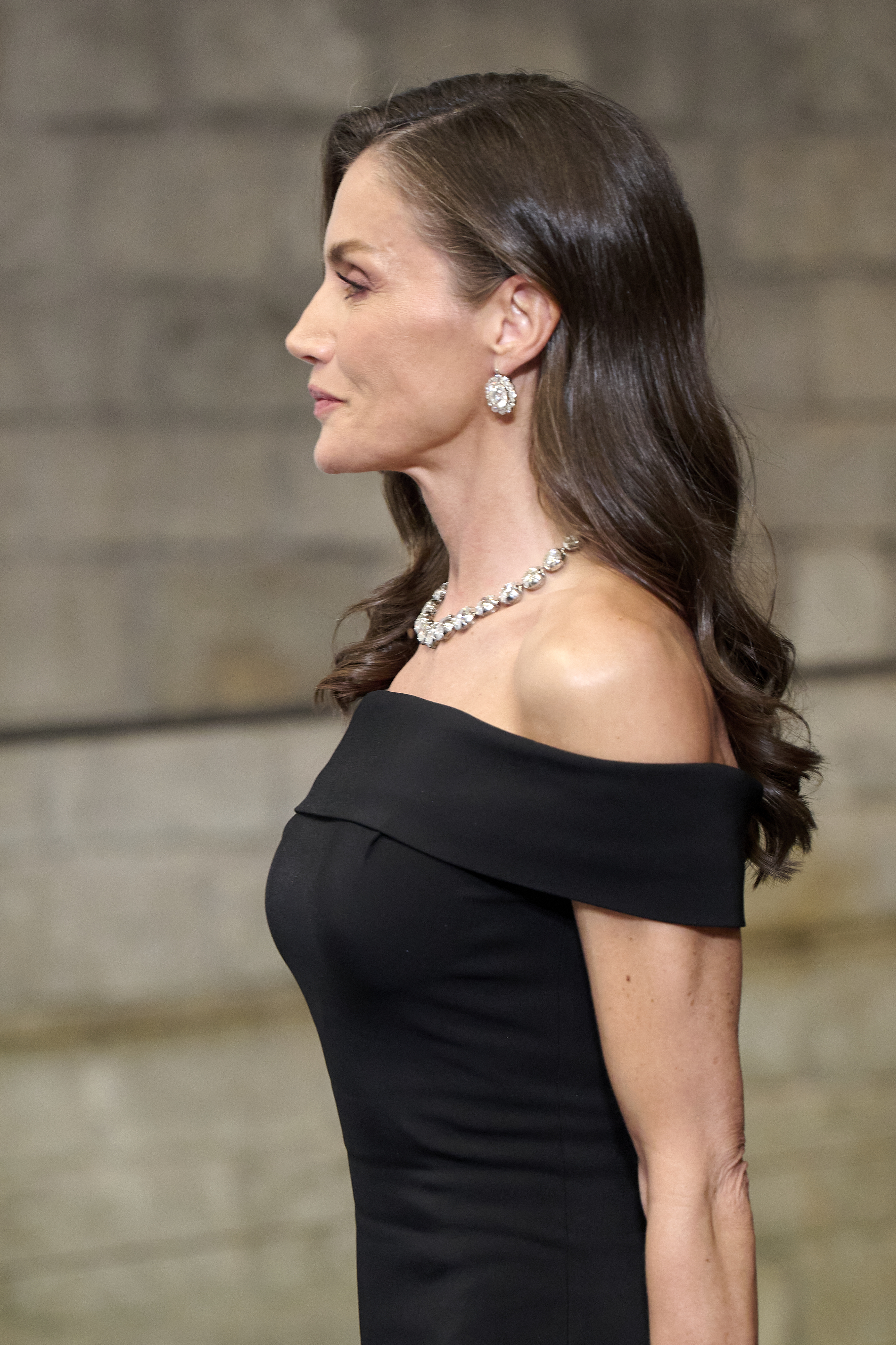 Queen Letizia wearing a black dress and diamond necklace