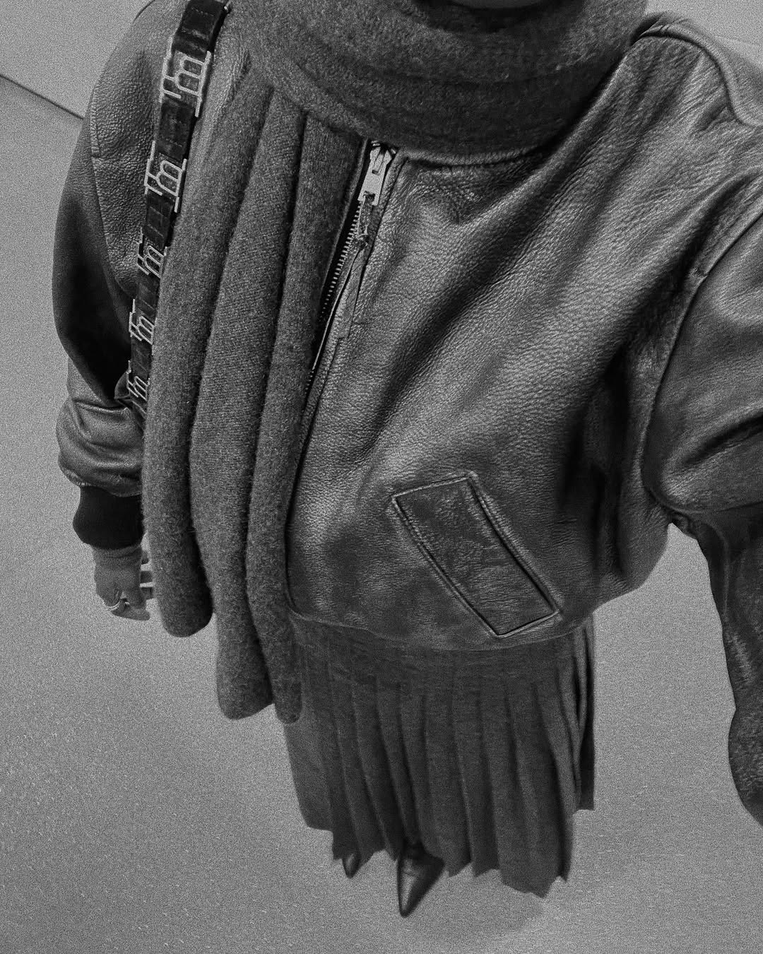 @daniellejinadu wears grey wool skirt