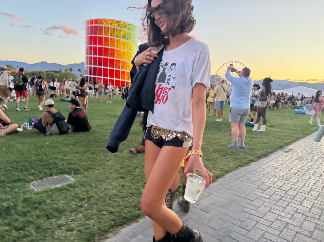 Woman in a graphic tee and shorts