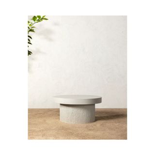 light grey stone round coffee table