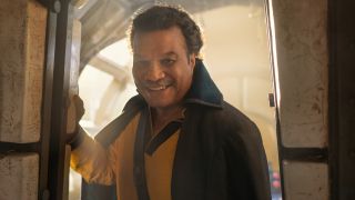Billy Dee Williams standing in the doorway of the Millennium Falcon in Star Wars: The Rise of Skywalker.
