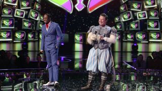 Nick Cannon and Billy Bush on The Masked Singer season 11