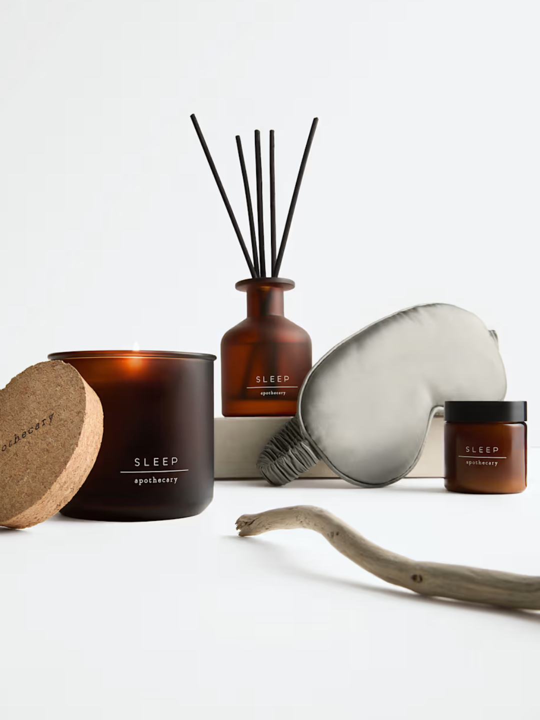 A sleep gift set from M&amp;amp;S with a sleep mask, a candle, a reed diffuser, and a cream