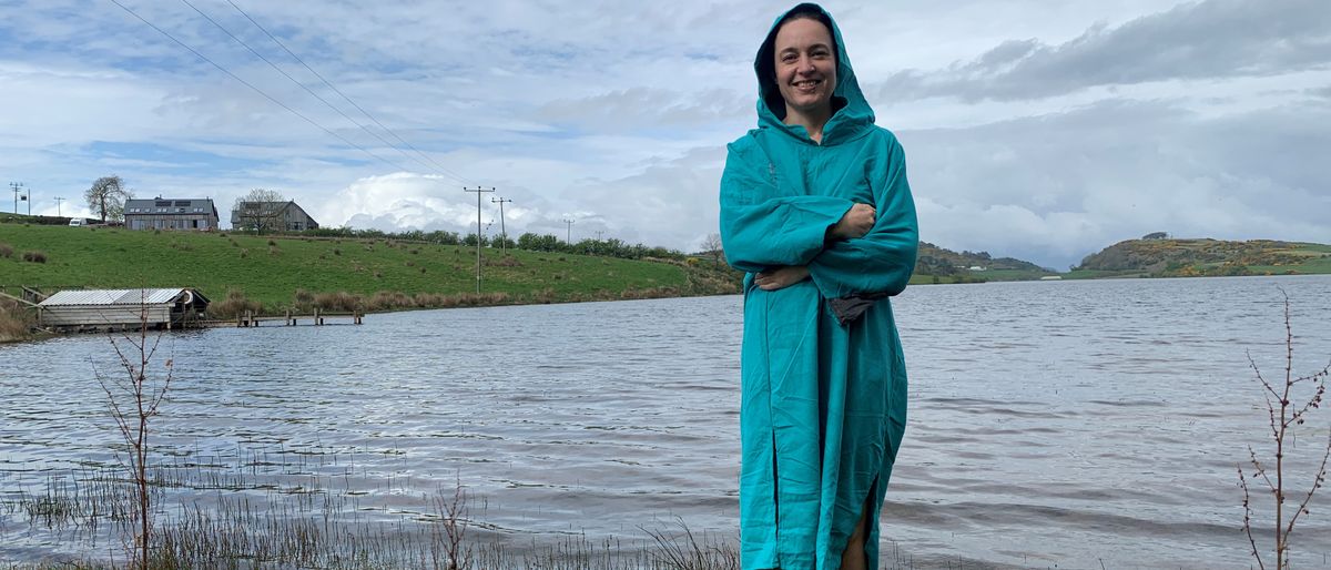 Julia Clarke using the Lifeventure Lightweight Changing Robe