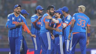Jasprit Bumrah of India, Ishan Kishan of India, Suryakumar Yadav, the captain of India, and Team India