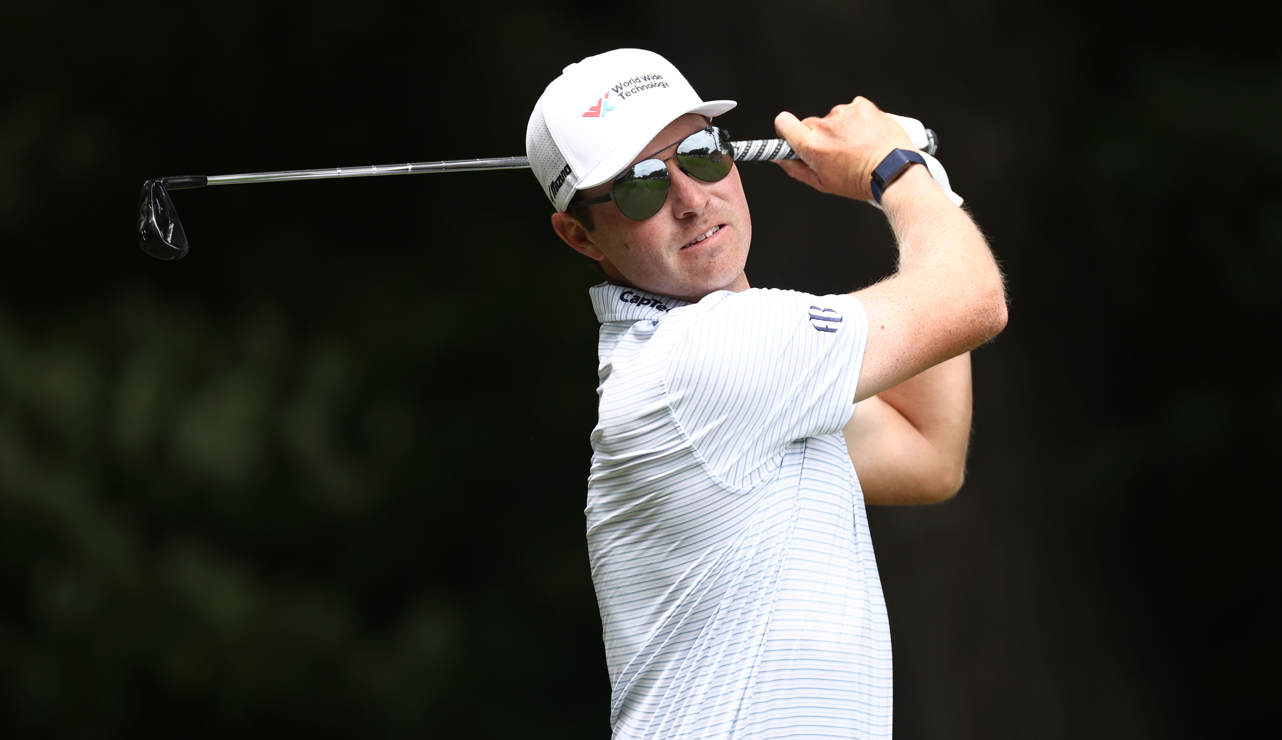 Ben Griffin hits a utility iron