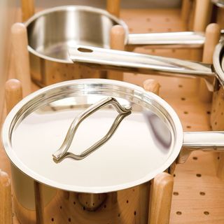 wooden pan drawers with kitchen utensils