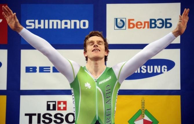 Martyn Irvine (Ireland) soaks it all in on the podium after winning the 15km scratch race world championship.