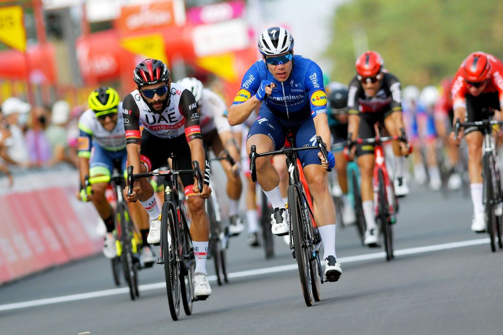 HEUSDENZOLDER BELGIUM JULY 21 Fabio Jakobsen of Netherlands and Team Deceuninck QuickStep stage winner celebrates at arrival Fernando Gaviria Rendon of Colombia and UAE Team Emirates during the 42nd Tour de Wallonie 2021 Stage 2 a 120km stage from Zolder Circuit to Zolder Circuit Race held at the Zolder Circuit due to flooding in the country tourdewallonie grandprixdewallonie on July 21 2021 in HeusdenZolder Belgium Photo by Luc ClaessenGetty Images