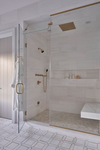 White marble bathroom with walk in shower