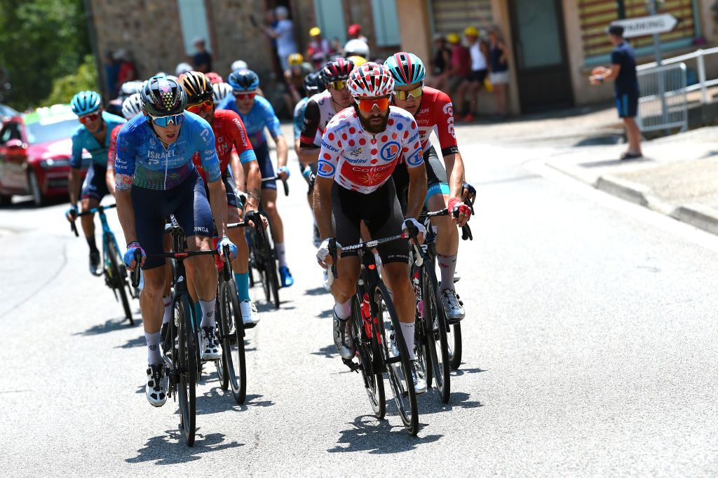 FOIX FRANCE JULY 19 LR Michael Woods of Canada and Team Israel Premier Tech and Simon Geschke of Germany and Team Cofidis Polka Dot Mountain Jersey compete in the breakaway during the 109th Tour de France 2022 Stage 16 a 1785km stage from Carcassonne to Foix TDF2022 WorldTour on July 19 2022 in Foix France Photo by Dario BelingheriGetty Images