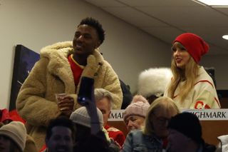 Taylor Swift wears a GANT jacket and a Liffner bag to a Chiefs game