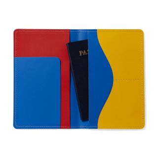 The blue, yellow and red MoMA Primary passport cover made of recycled leather