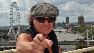 Brian Johnson in London, with the London Eye in the background