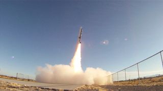 A suborbital UP Aerospace rocket soars on May 20,2011 launch, pushing an eclectic mix of payloads to the edge of space on a suborbital trajectory. The rocket carried student experiments, cremated human remains and wedding rings on the short spaceflight. 