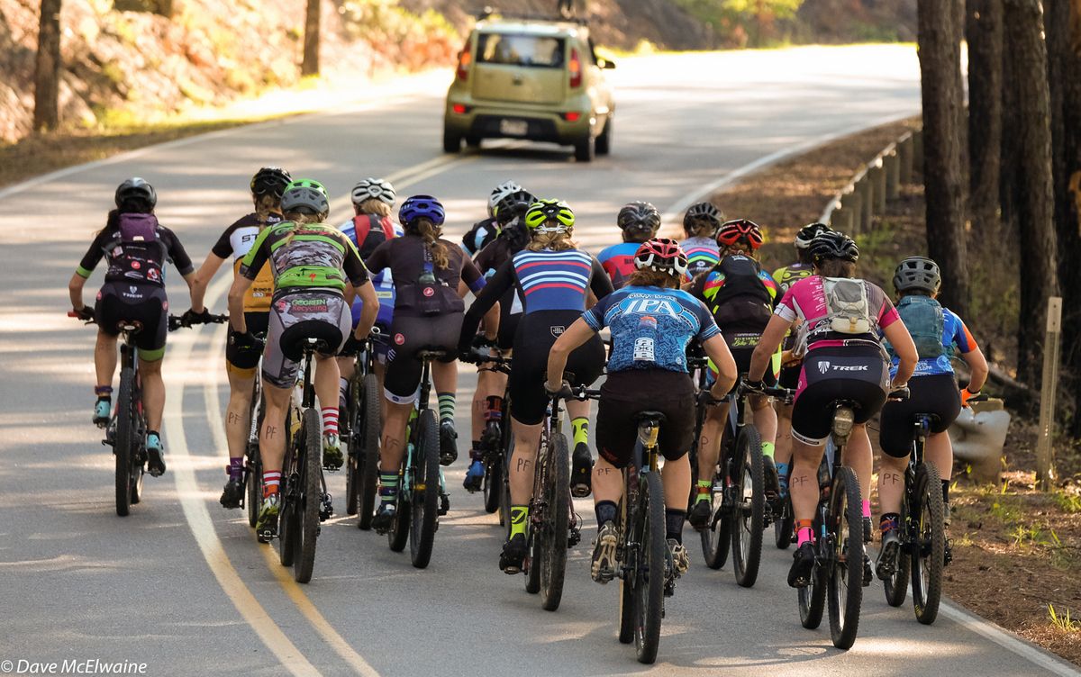 The uphill road section of the starting loop was intended to string out the field before they entered singletrack