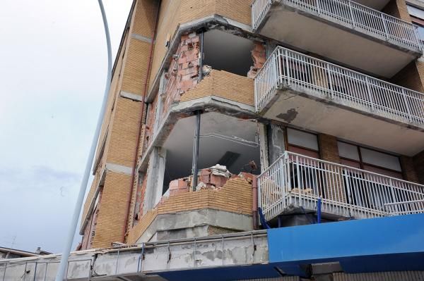 Signs of the damage caused by the earthquake last year