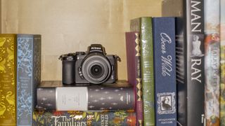 Nikon Z50 camera on a stack of books
