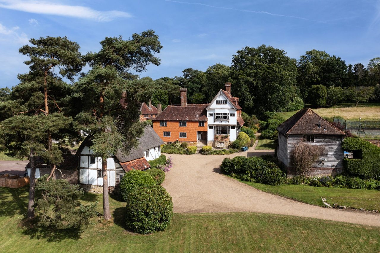 The greenery of the High Weald AONB provides a magnificent backdrop for Grade II*-listed Fordcombe Manor in Kent. .