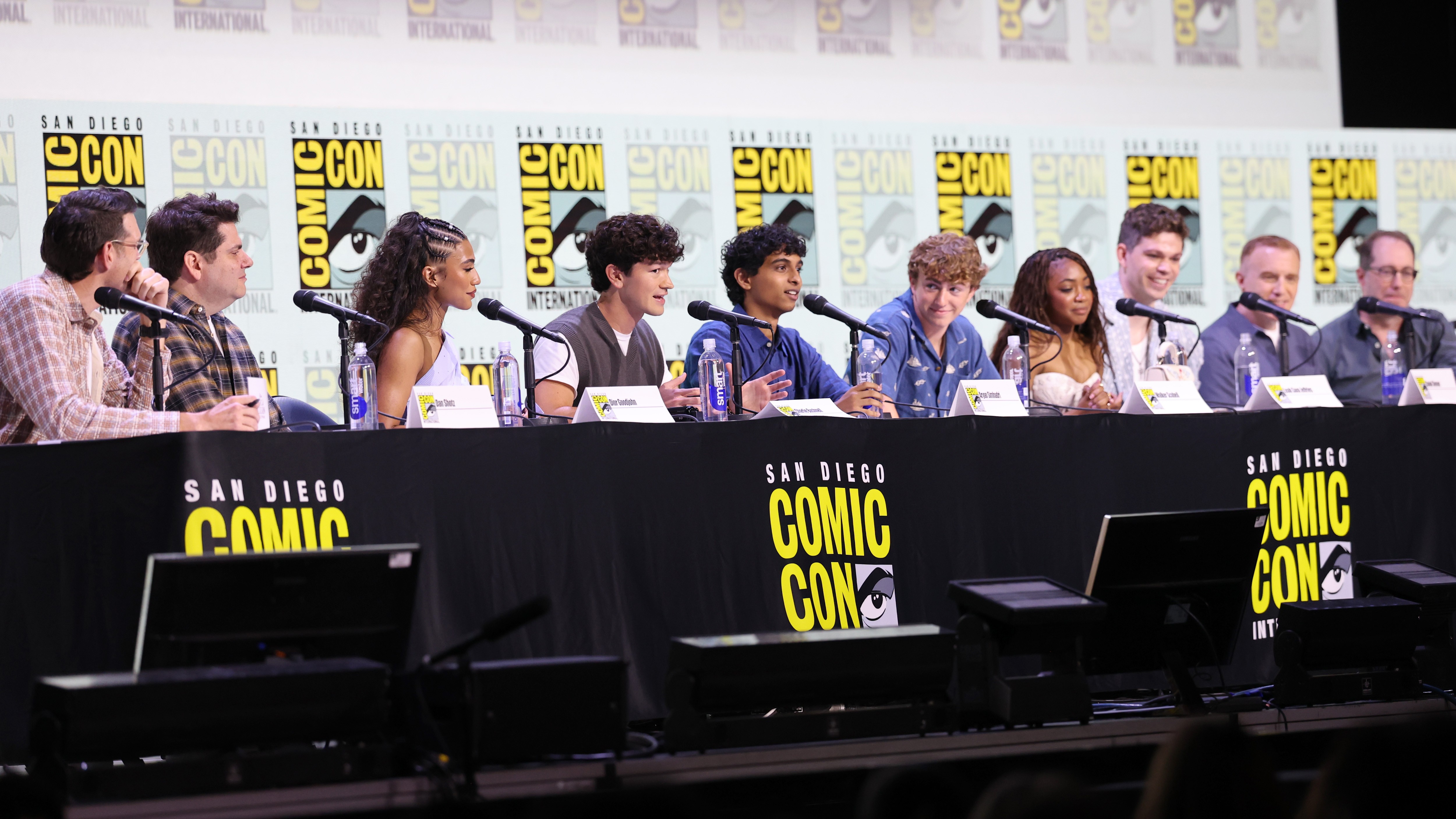 (L-R) Timothy Simons, Dan Shotz, Dior Goodjohn, Charlie Bushnell, Aryan Simhadri, Walker Scobell, Leah Sava&#039; Jeffries, Daniel Diemer, Jonathan E. Steinberg and Craig Silverstein speak onstage at the &quot;Percy Jackson And The Olympians&quot; Panel during 2025 Comic-Con International: San Diego at San Diego Convention Center on July 24, 2025 in San Diego, California.