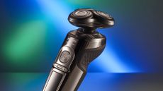 The best electric shaver on a green and blue abstract background