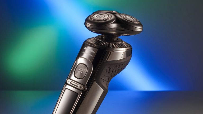 The best electric shaver on a green and blue abstract background