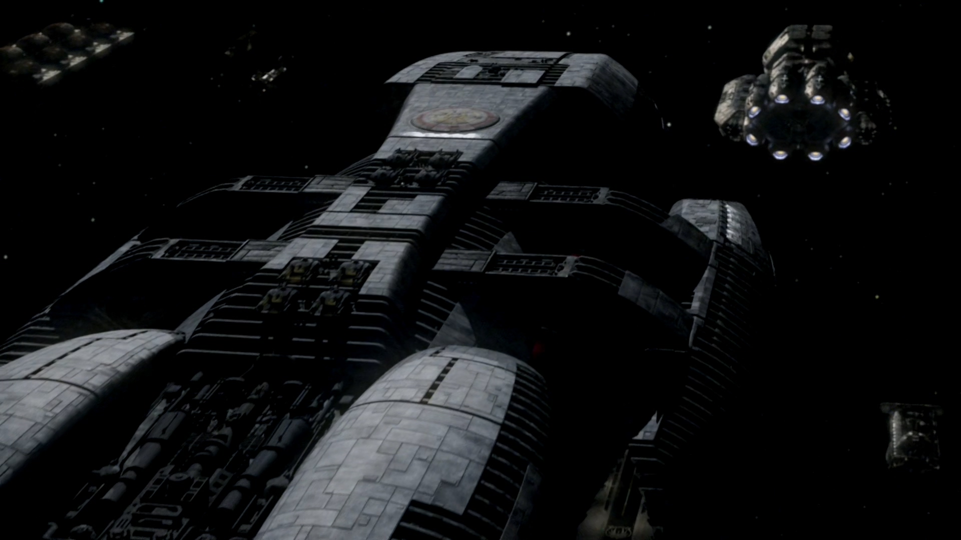 Several human spaceships flying in formation in Battlestar Galactica (2004)