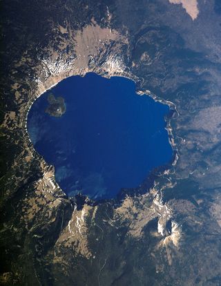 This astronaut image of Crater Lake in Oregon was captured July 19, 2006 from the International Space Station.