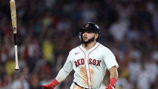 Wilyer Abreu #52 of the Boston Red Sox hits a grand slam during the eighth inning against the Cincinnati Reds at Fenway Park