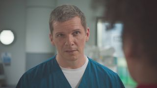 Max Cristie is shocked by Donna Jackson's confession in Casualty episode Too Young, Too Soon.