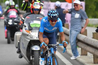 Richard Carapaz rides to the finish of stage 14 at the Giro