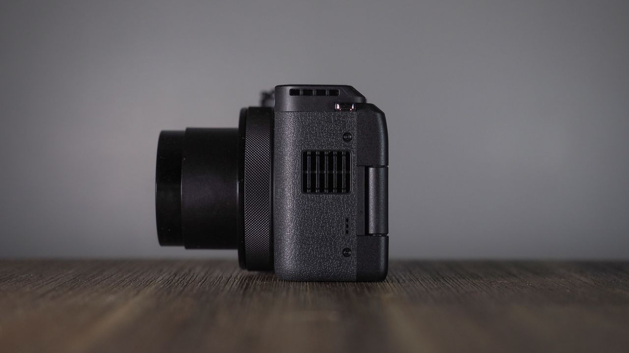 Canon PowerShot V1 on a wooden surface