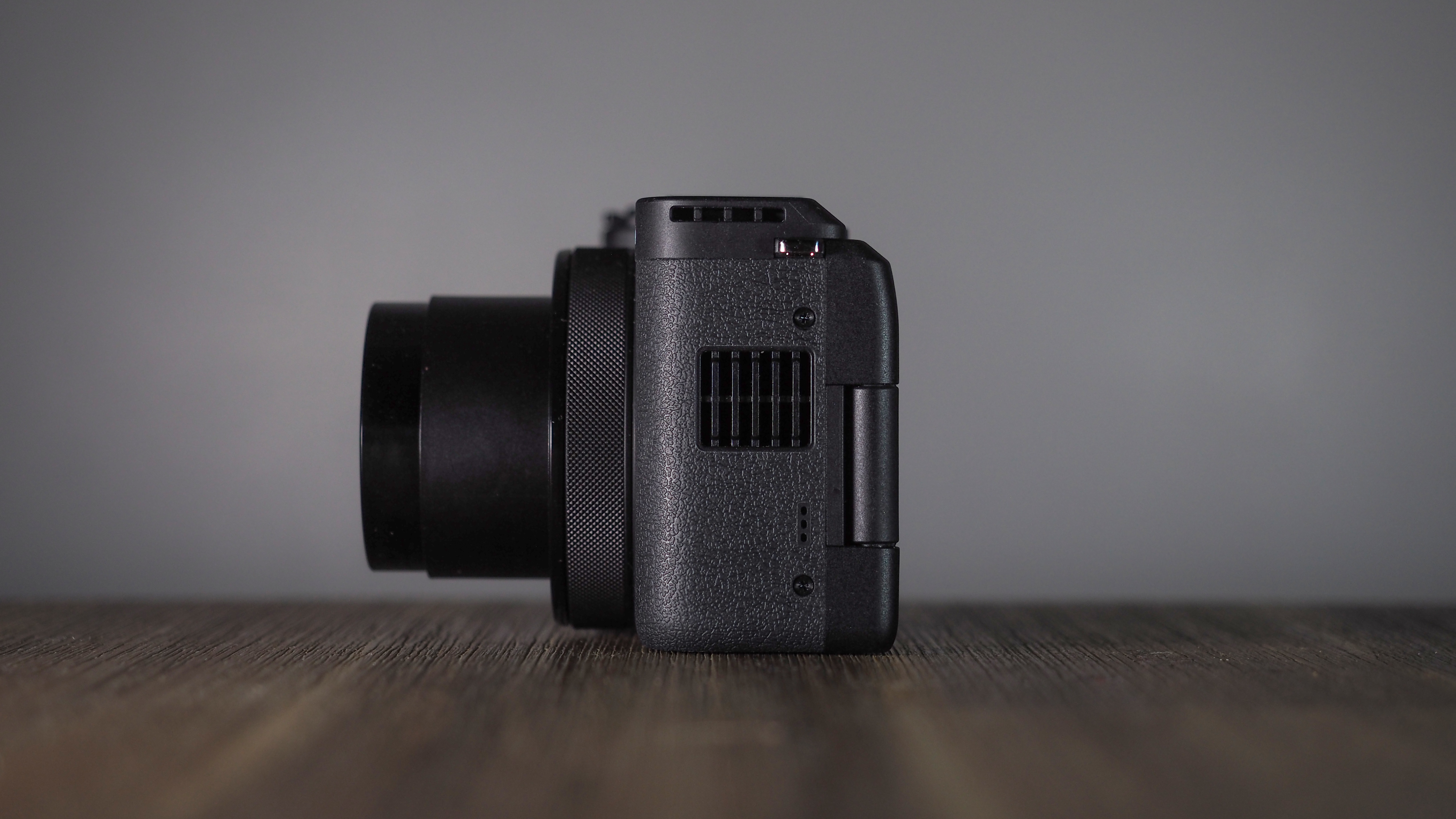 Canon PowerShot V1 on a wooden surface
