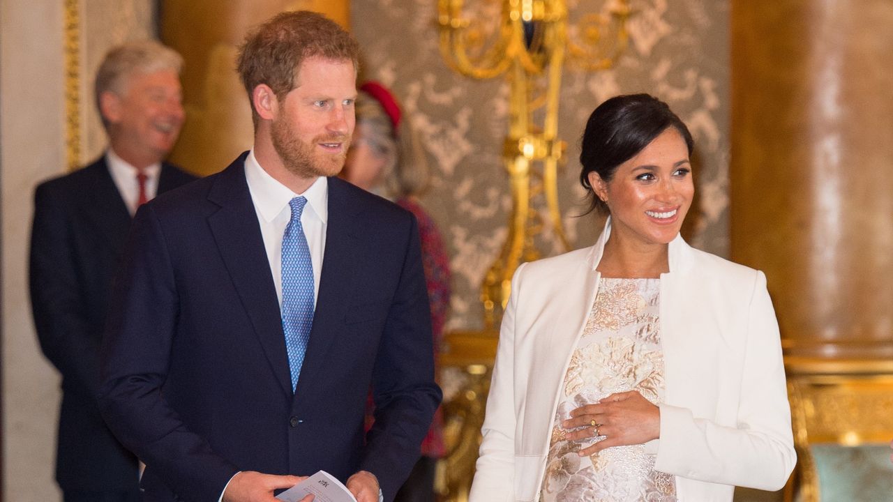  Meghan, Duchess of Sussex and Prince Harry, Duke of Sussex attend a reception to mark the fiftieth anniversary of the investiture of the Prince of Wales at Buckingham Palace on March 5, 2019 in London, England