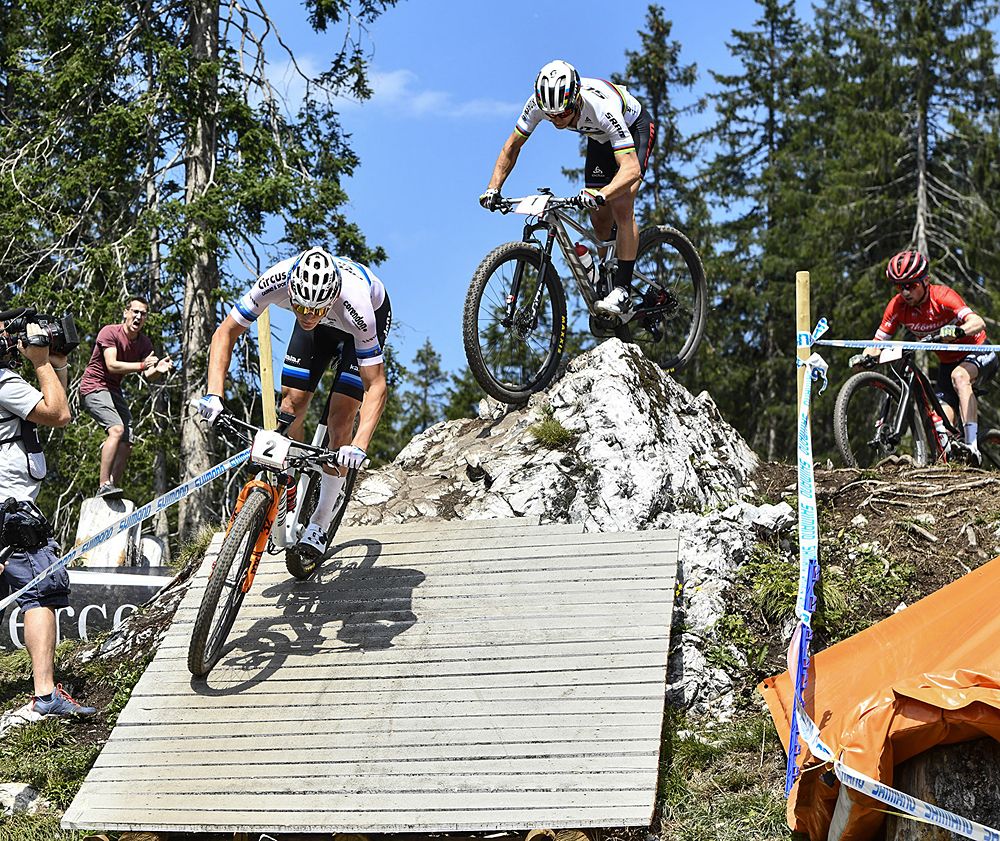 Mathieu van der Poel (Corendon-Circus) leads Nino Schurter (Scott-SRAM MTB Racing) and Mathias Flueckiger (Th&ouml;mus RN Swiss Bike Team)