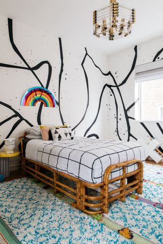 Teen bedroom with statement splash wallpaper