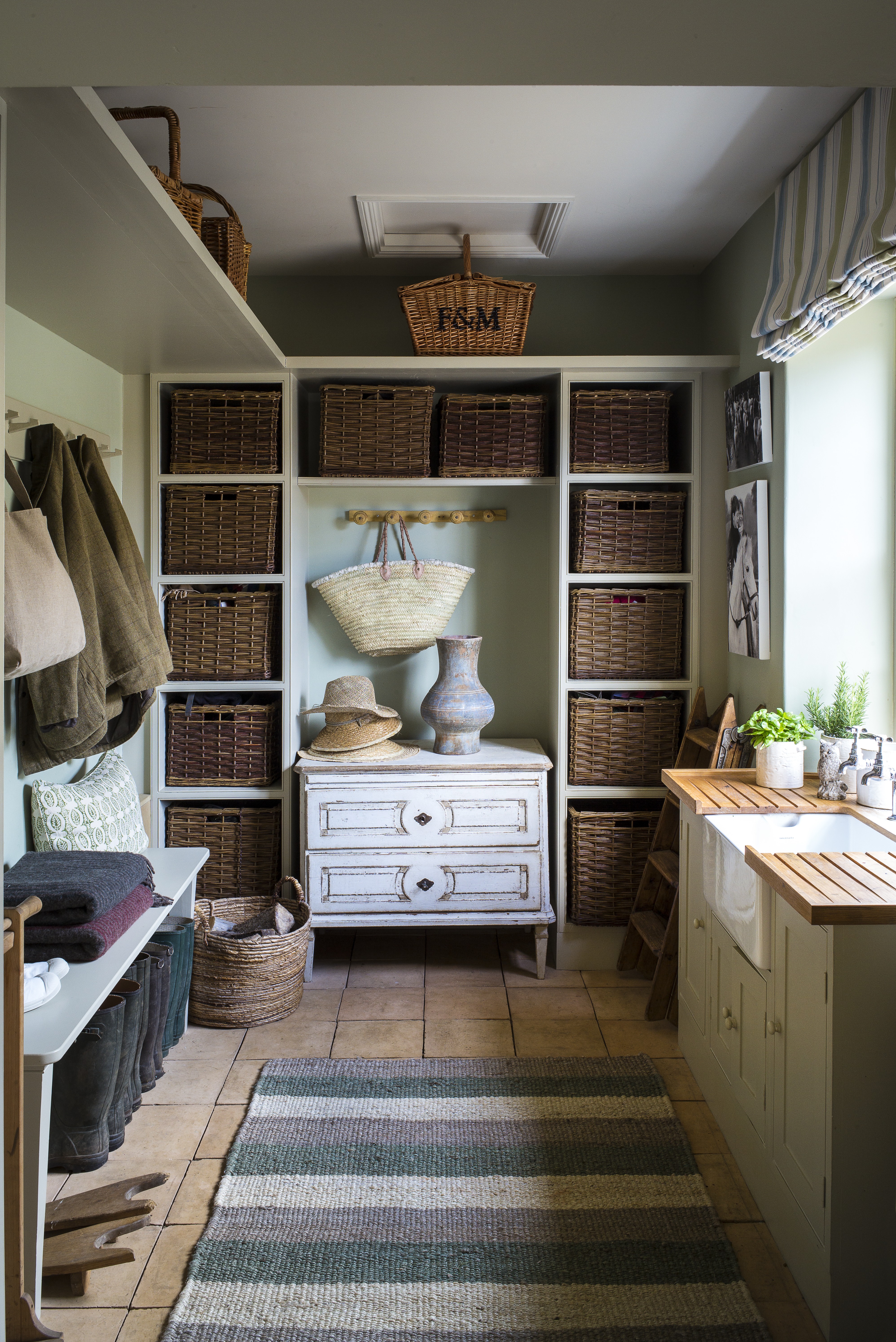 small utility room with storage and shelving