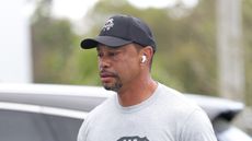 Tiger Woods walks into SoFi Center ahead of Jupiter Links v Atlanta Drive in TGL