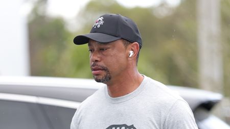 Tiger Woods walks into SoFi Center ahead of Jupiter Links v Atlanta Drive in TGL