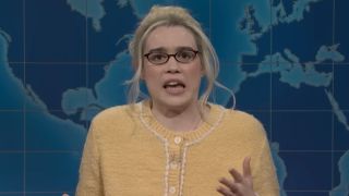 Jane Wickline dressed in a yellow sweater on Weekend Update.