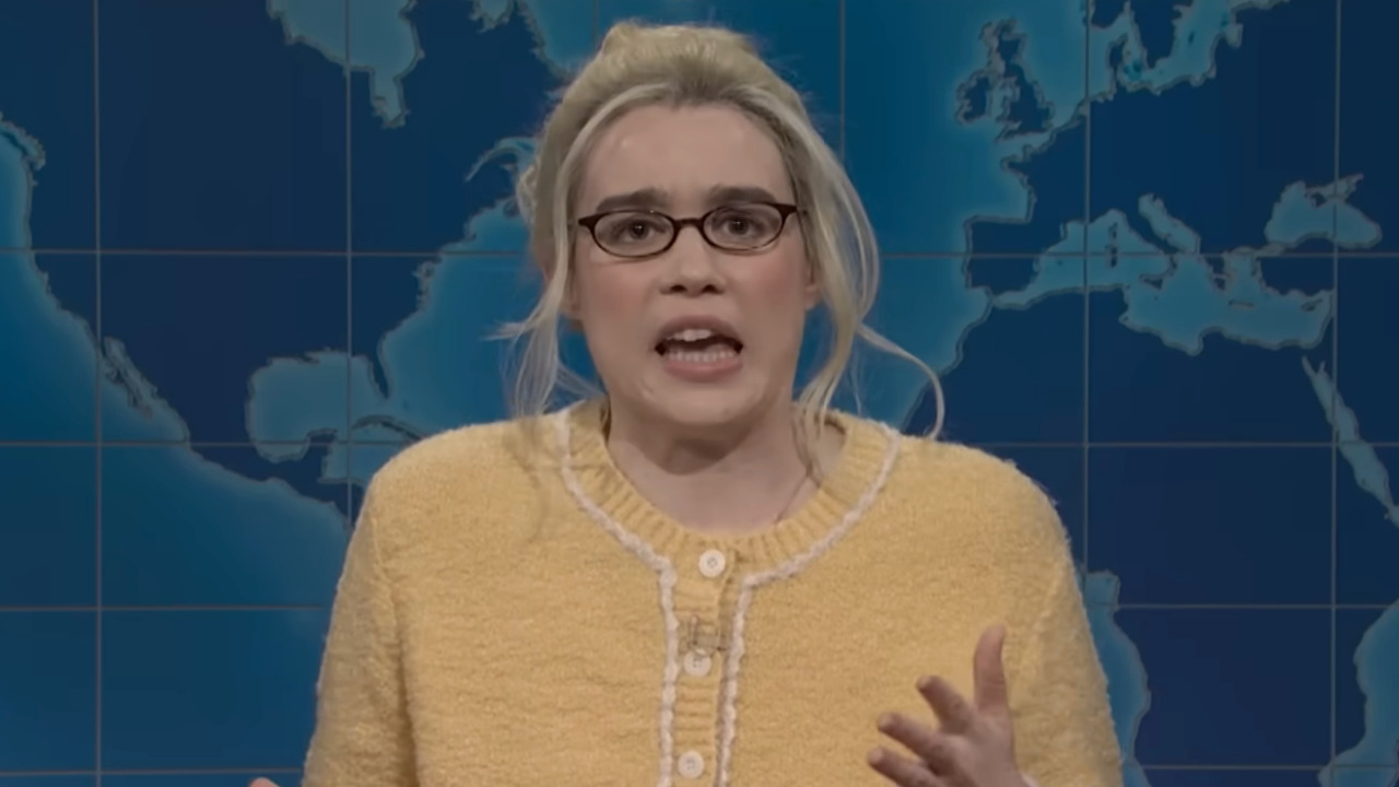 Jane Wickline dressed in a yellow sweater on Weekend Update.