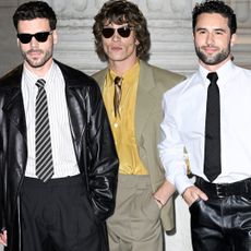 Connor Storrie, Francois Arnaud, and Robbie G.K. from Heated Rivalry attended the Saint Laurent Men's Fall 2026 show together