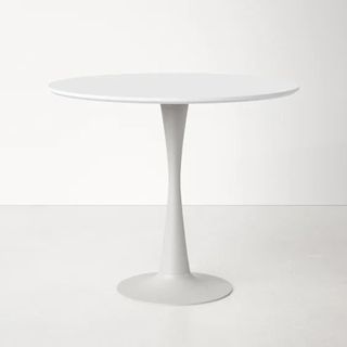 White pedestal dining table