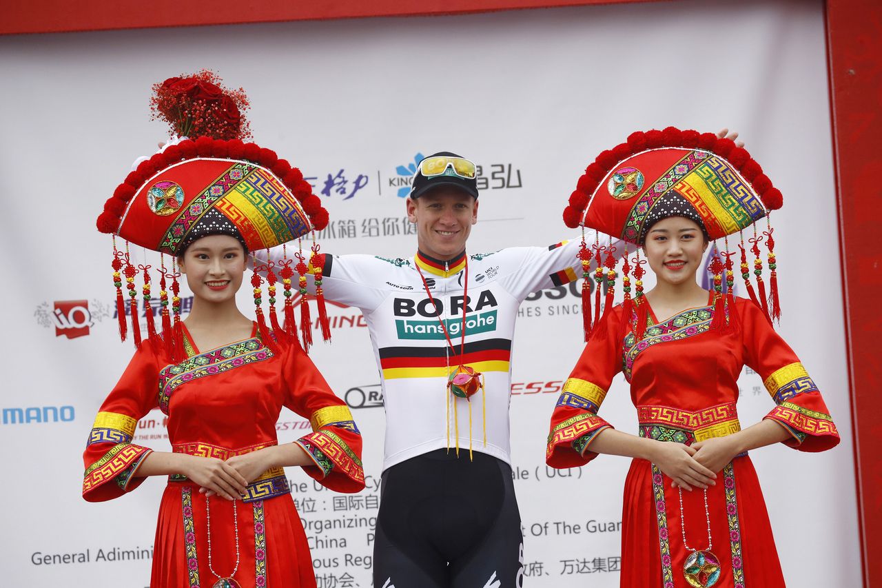 Pascal Ackermann (Bora-Hansgrohe) shows off his German national chsmpion's jersey on the podium