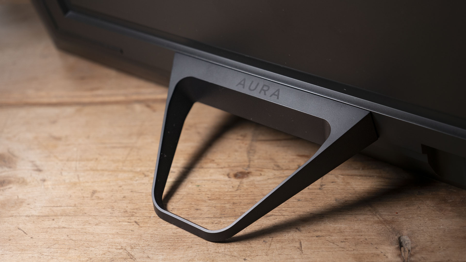 A close up of the The Aura Ink 'E Ink' digital photo frame's stand